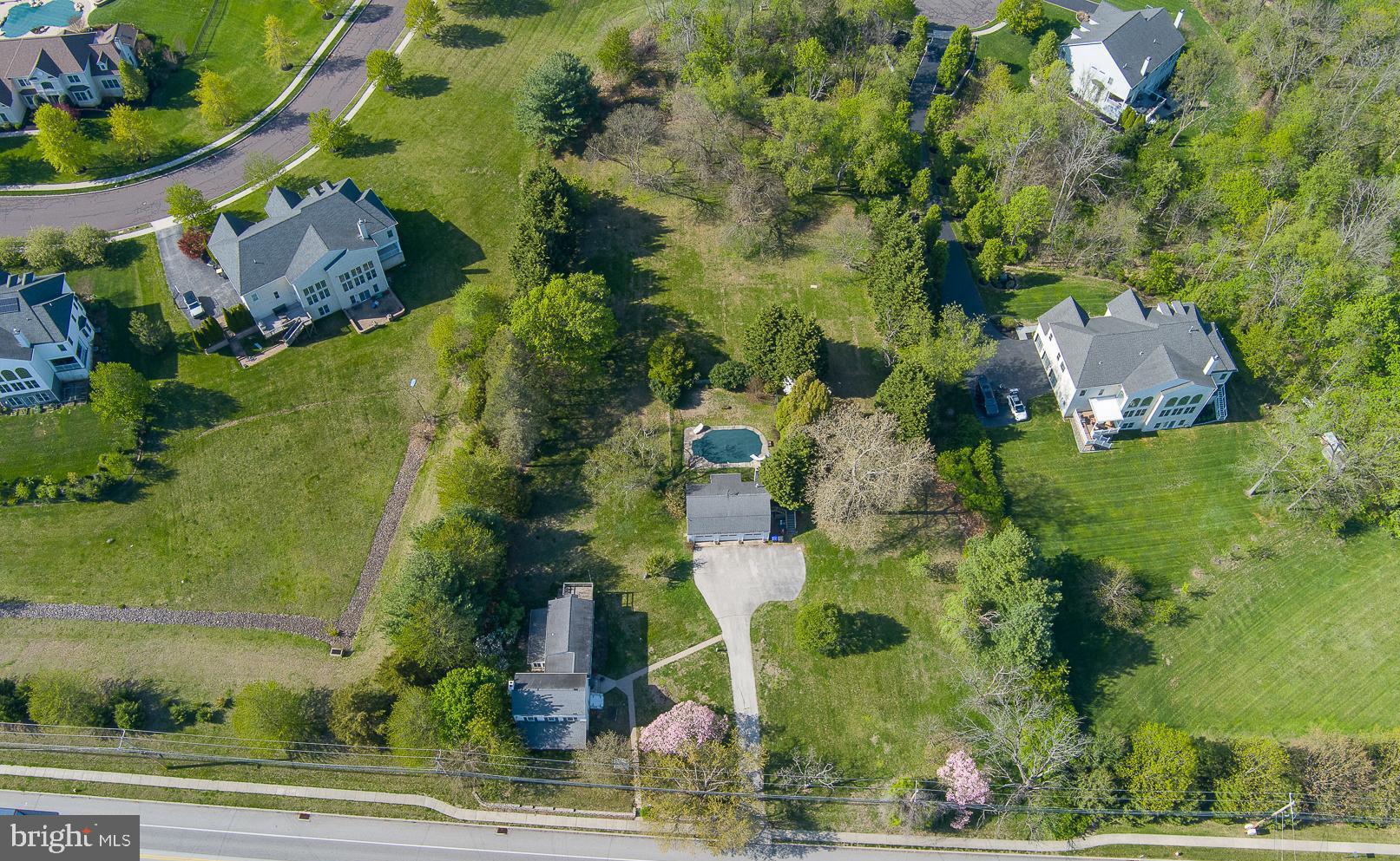 526 Egypt Road Phoenixville, PA 19460 - Photo 60 of 64 an aerial view of residential house with outdoor space and trees all around