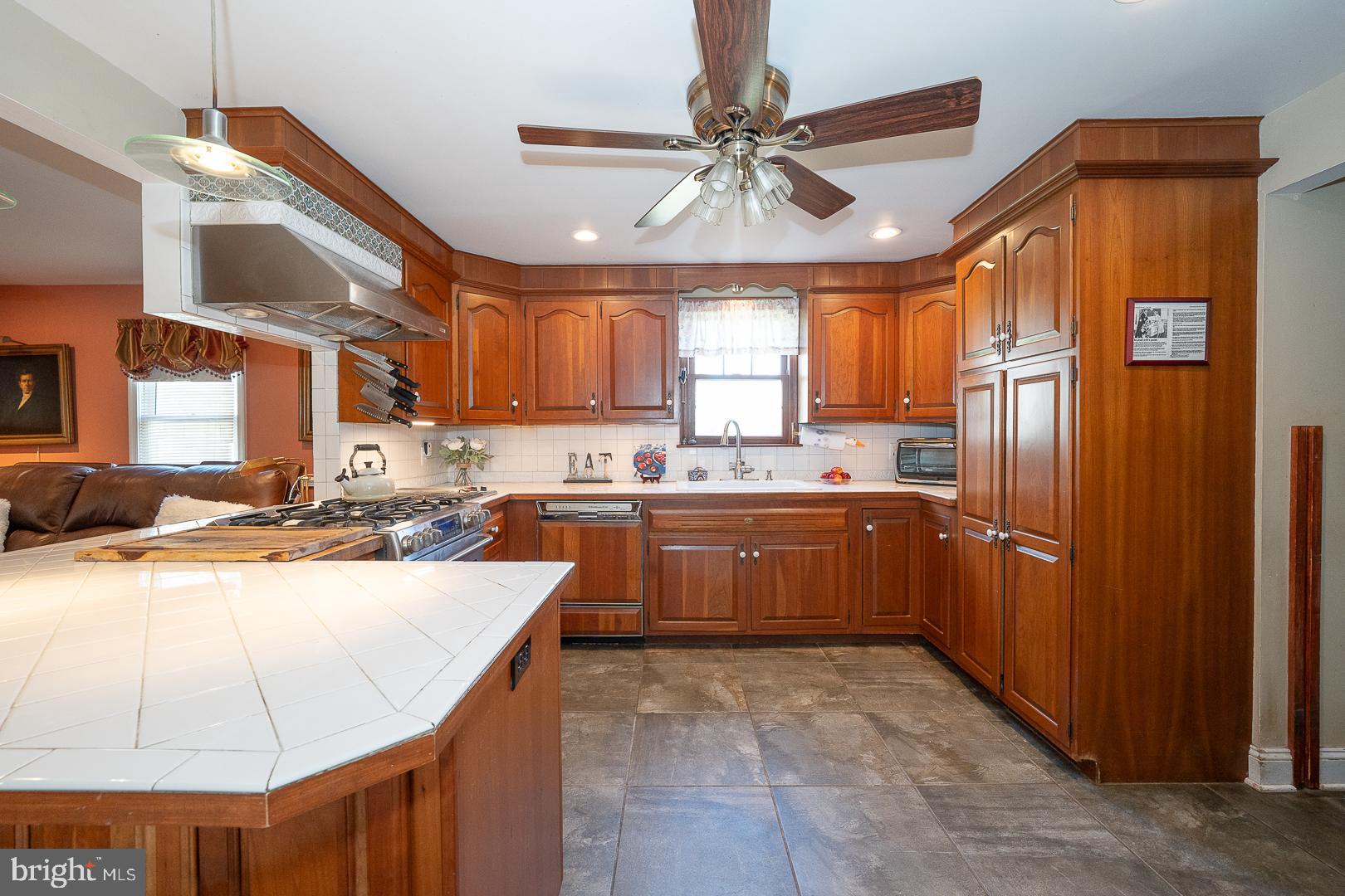 526 Egypt Road Phoenixville, PA 19460 - Photo 9 of 64 a large kitchen with stainless steel appliances kitchen island granite countertop a stove refrigerator and cabinets