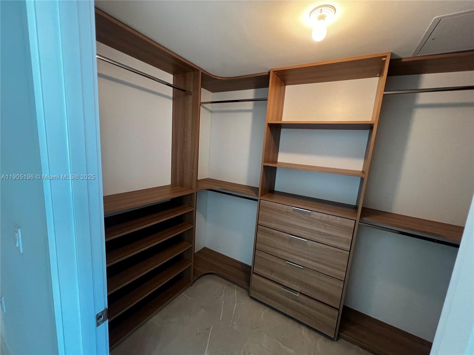 300 Sunny Isles Boulevard, Unit 4901 Sunny Isles Beach, FL 33160 - Photo 14 of 22 a view of walk in closet