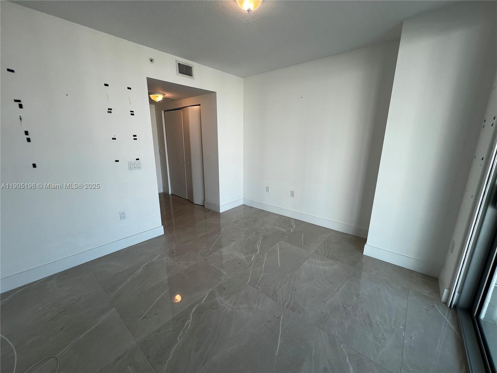 300 Sunny Isles Boulevard, Unit 4901 Sunny Isles Beach, FL 33160 - Photo 20 of 22 a view of an empty room
