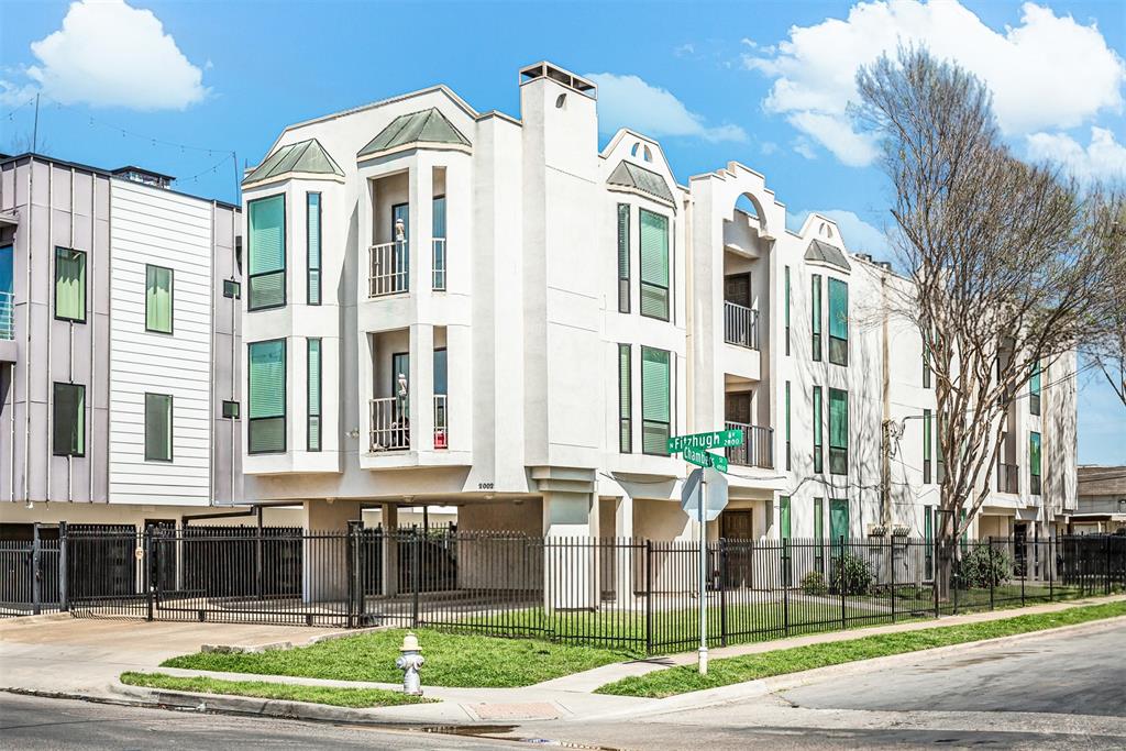 2002 North Fitzhugh Avenue, Unit 2 Dallas, TX 75204 - Photo 29 of 29 a front view of a residential apartment building with a yard