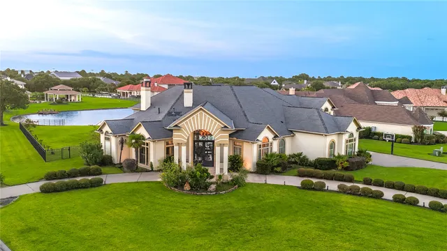 an aerial view of a house with a garden