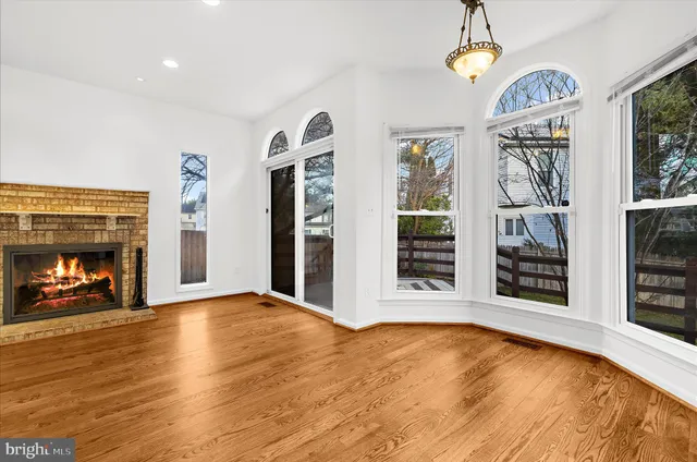 a view of kitchen with wooden floor
