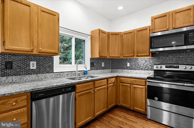 a view of a room with a wooden wall
