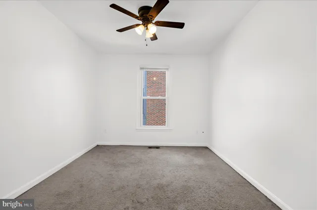 an aerial view of houses with outdoor space