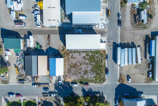 an aerial view of houses with outdoor space
