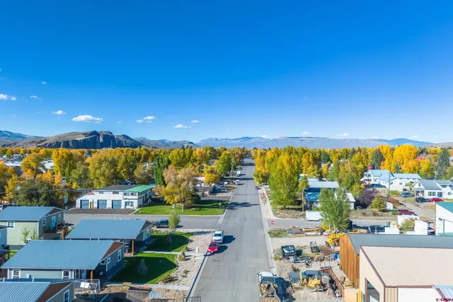 a view of a chairs and table in a patio