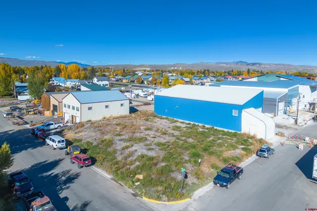 a view of a terrace with a table and chairs
