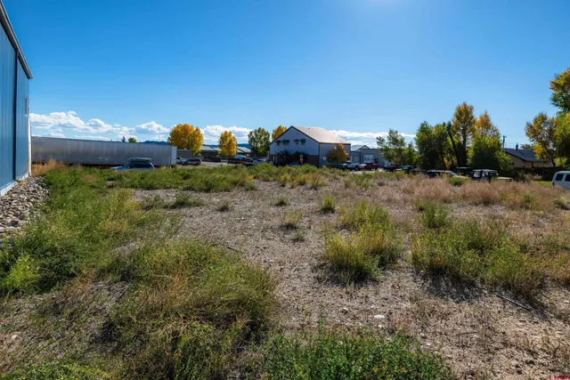 a view of a houses with a yard
