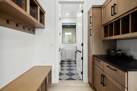 a kitchen with a sink cabinets and window