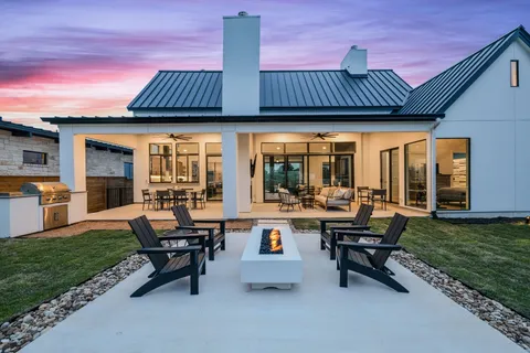 a view of outdoor space yard deck patio and fire pit