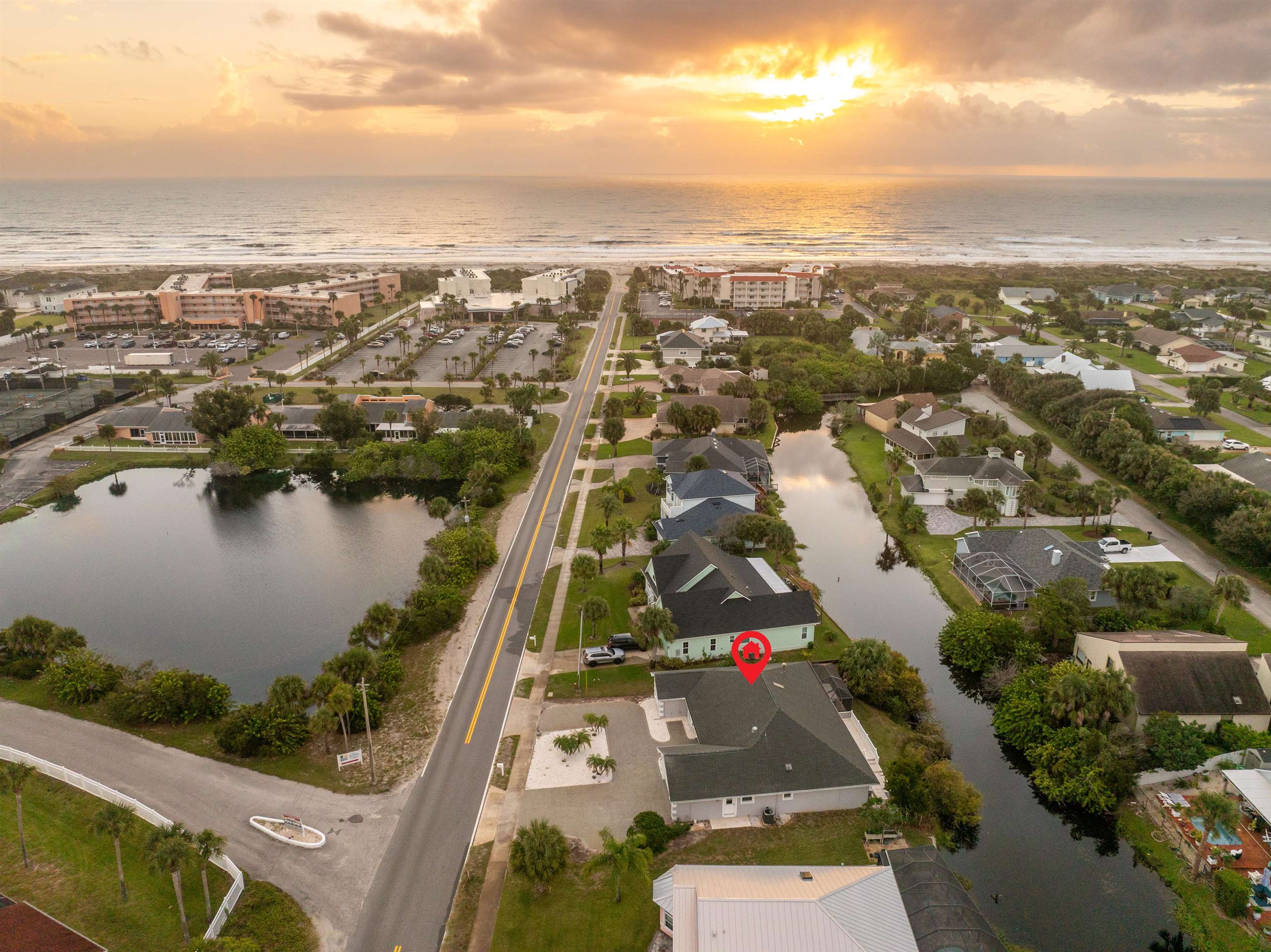 21 Ocean Trace Road St. Augustine, FL 32080 - Photo 1 of 48 an aerial view of residential building and lake view