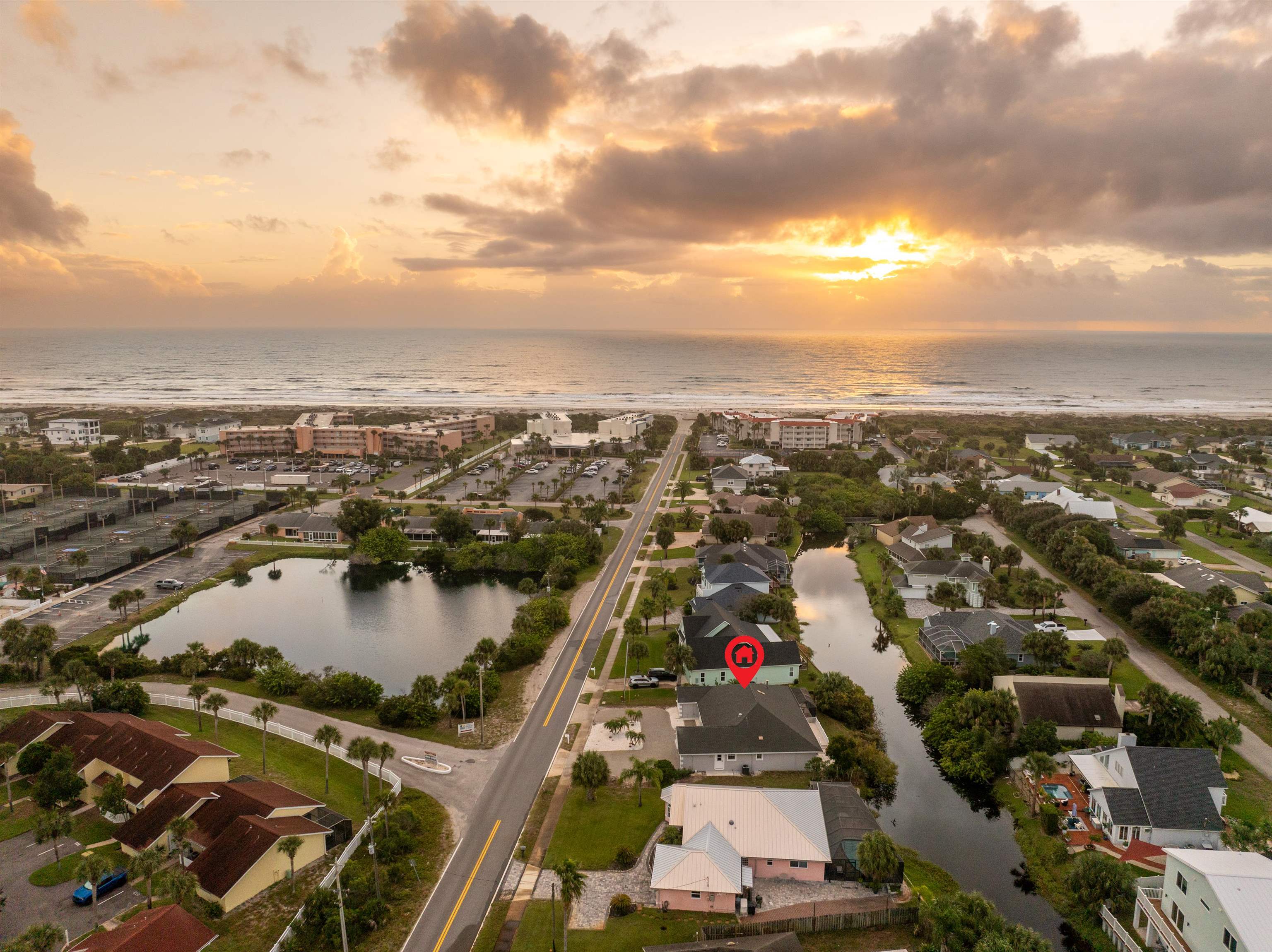 21 Ocean Trace Road St. Augustine, FL 32080 - Photo 13 of 48 an aerial view of residential building and lake