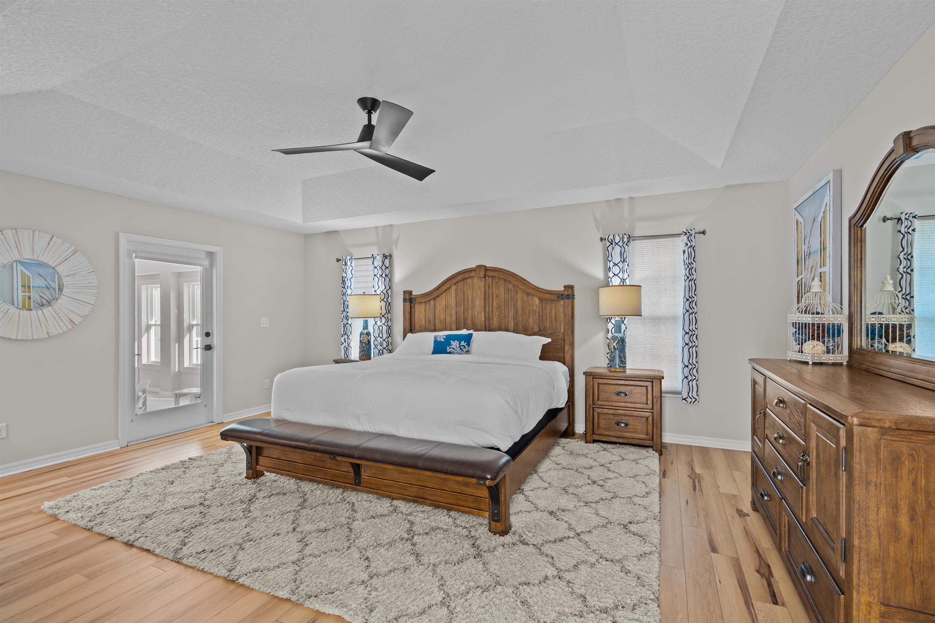 21 Ocean Trace Road St. Augustine, FL 32080 - Photo 28 of 48 a bed room with a bed and a dresser