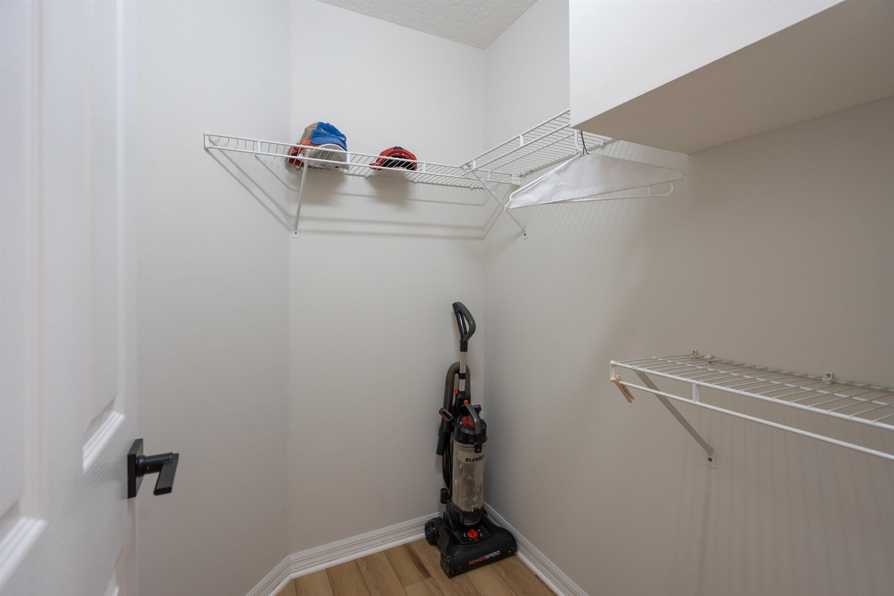 21 Ocean Trace Road St. Augustine, FL 32080 - Photo 33 of 48 a view of storage and utility room with racks on the wall