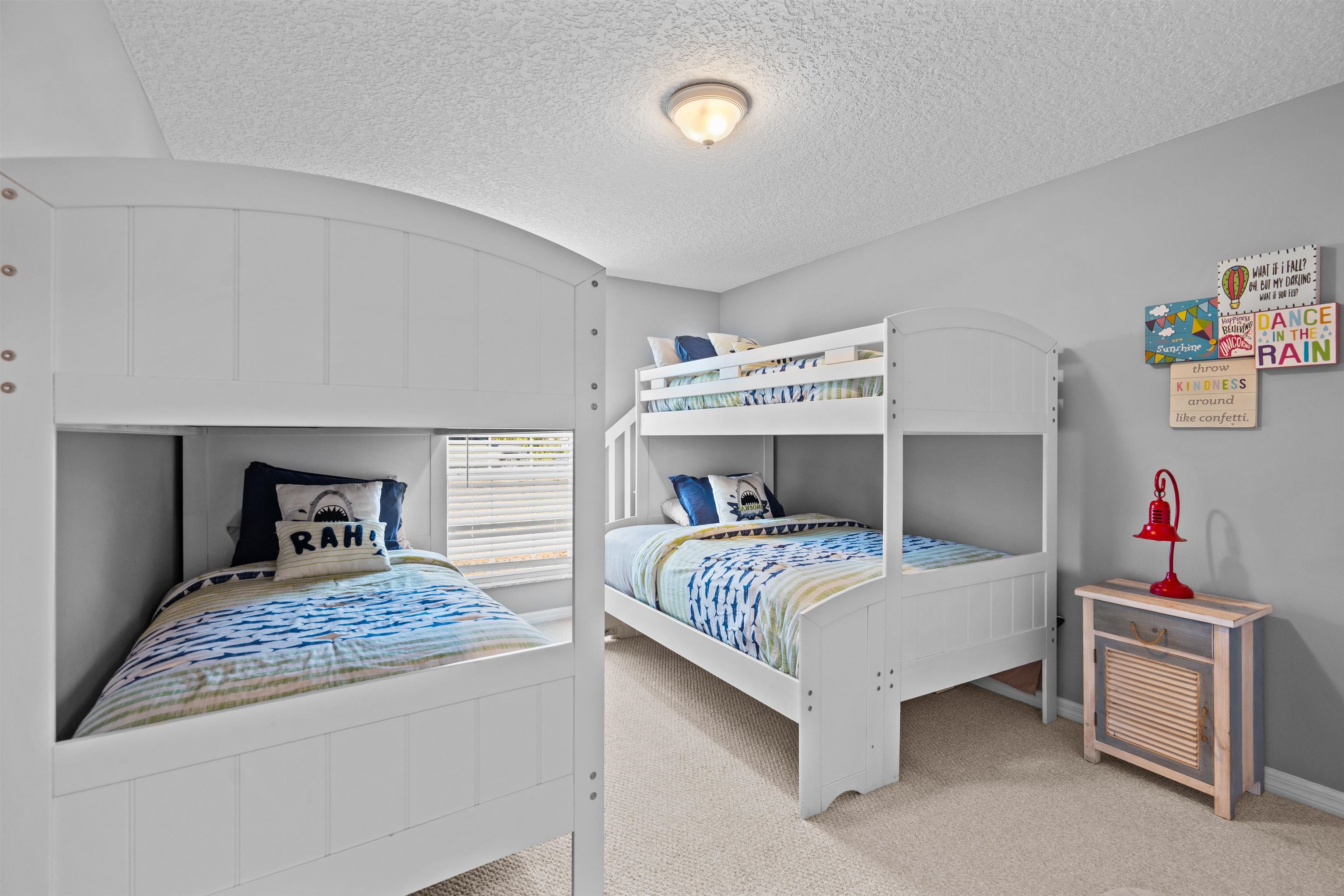 21 Ocean Trace Road St. Augustine, FL 32080 - Photo 34 of 48 a bedroom that has a bed and a table in it