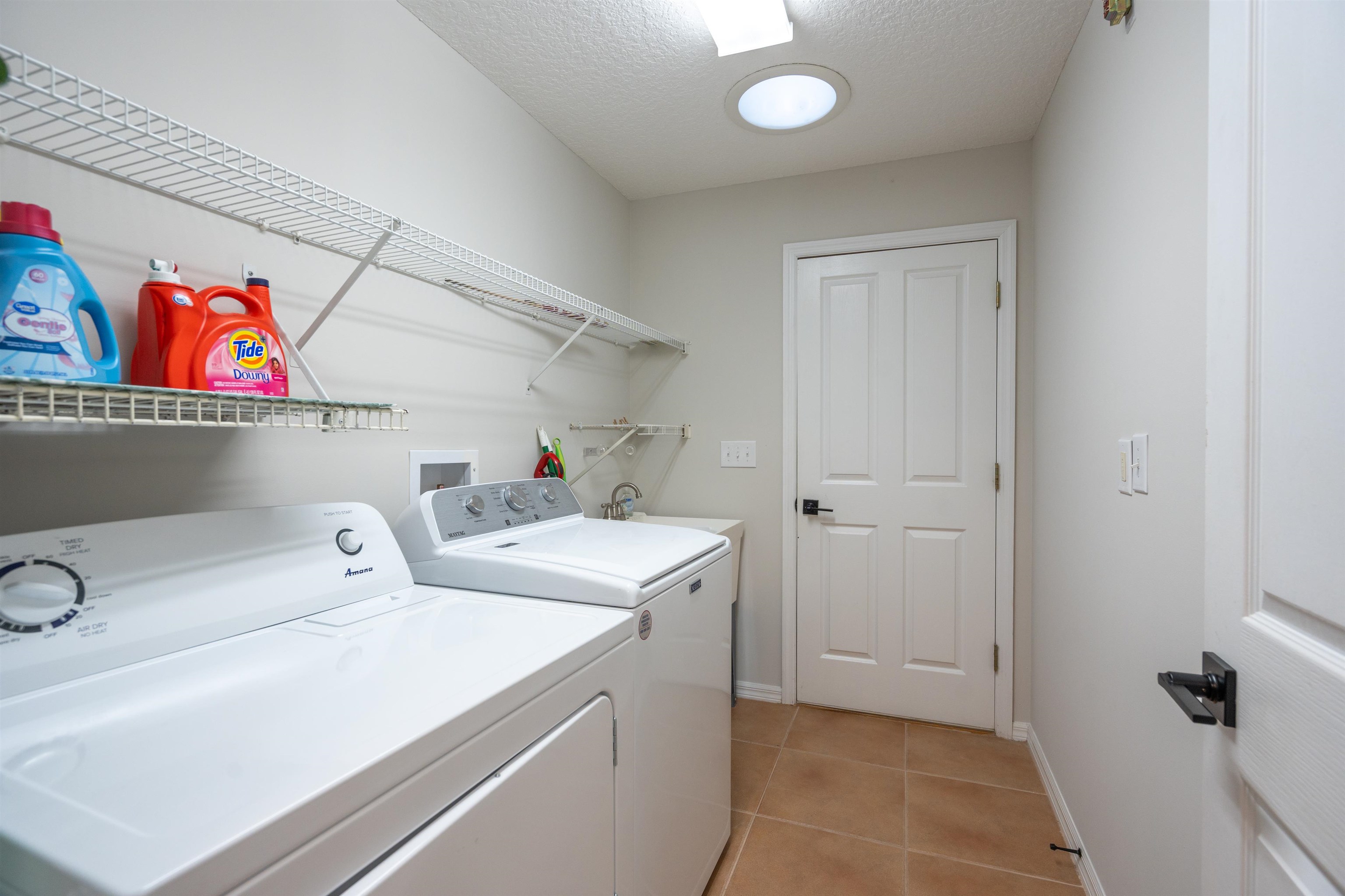 21 Ocean Trace Road St. Augustine, FL 32080 - Photo 39 of 48 a utility room with dryer and washer