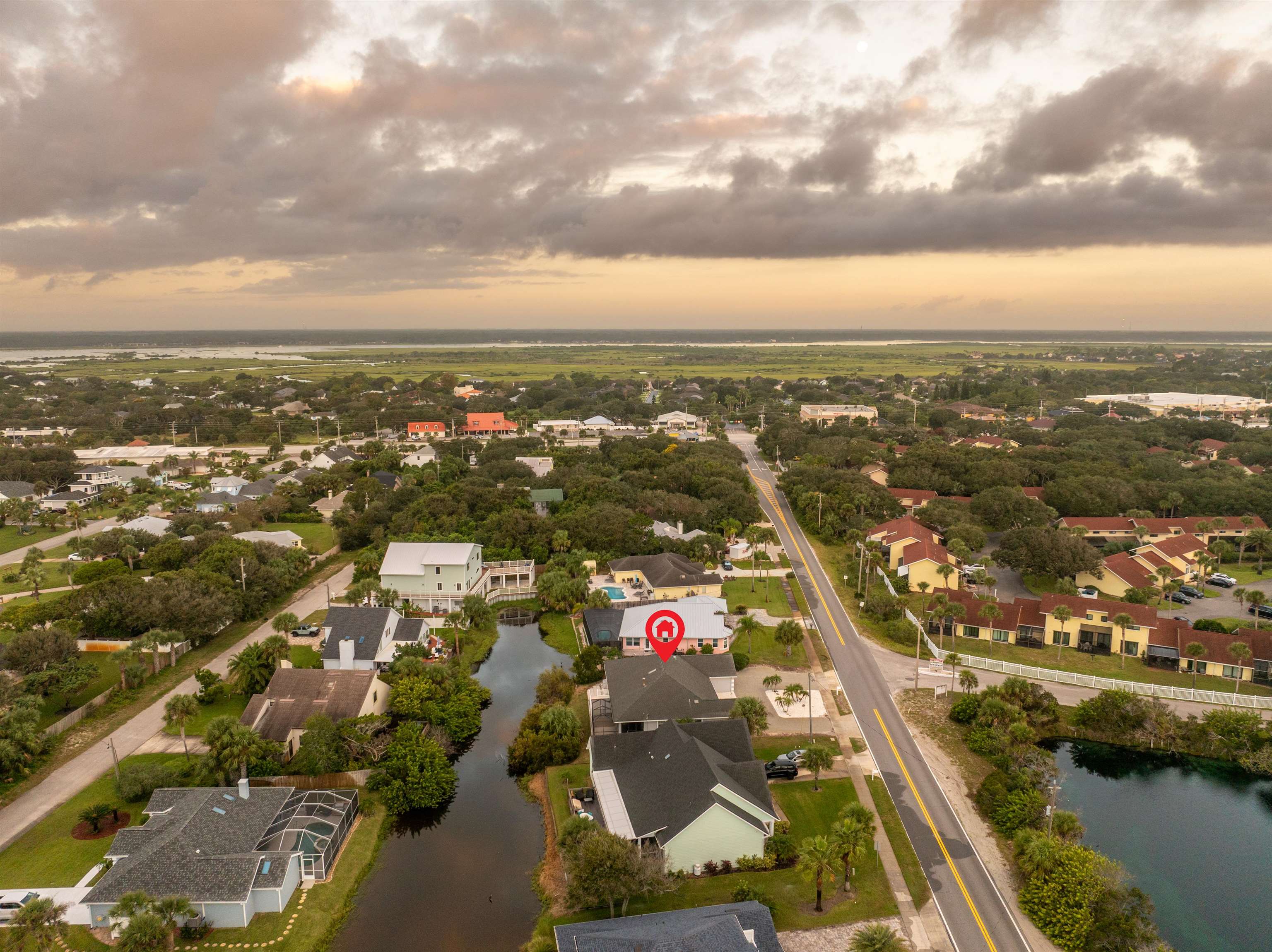 21 Ocean Trace Road St. Augustine, FL 32080 - Photo 8 of 48 an aerial view of city and lake