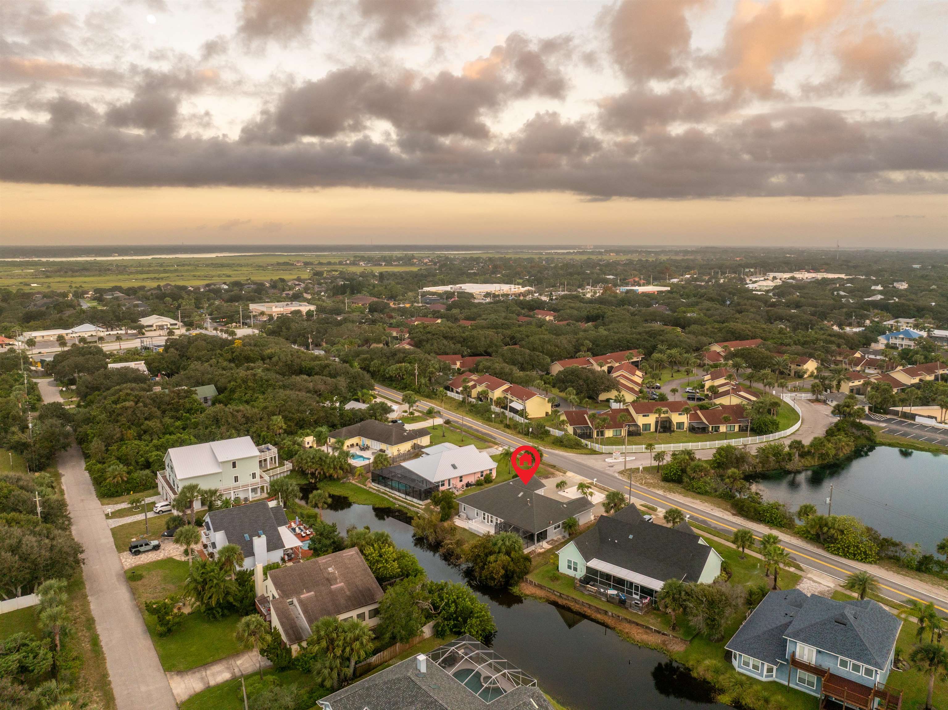 21 Ocean Trace Road St. Augustine, FL 32080 - Photo 9 of 48 an aerial view of city and lake