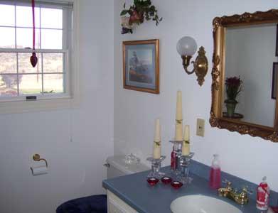 2341 Rosenkranz Road Tieton, WA 98947 - Photo 13 of 23 a bathroom with a sink mirror and vanity