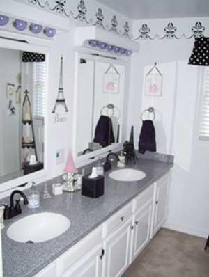 2341 Rosenkranz Road Tieton, WA 98947 - Photo 16 of 23 a bathroom with double vanity sinks a mirror and a shower