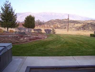 2341 Rosenkranz Road Tieton, WA 98947 - Photo 18 of 23 a view of a city from a backyard