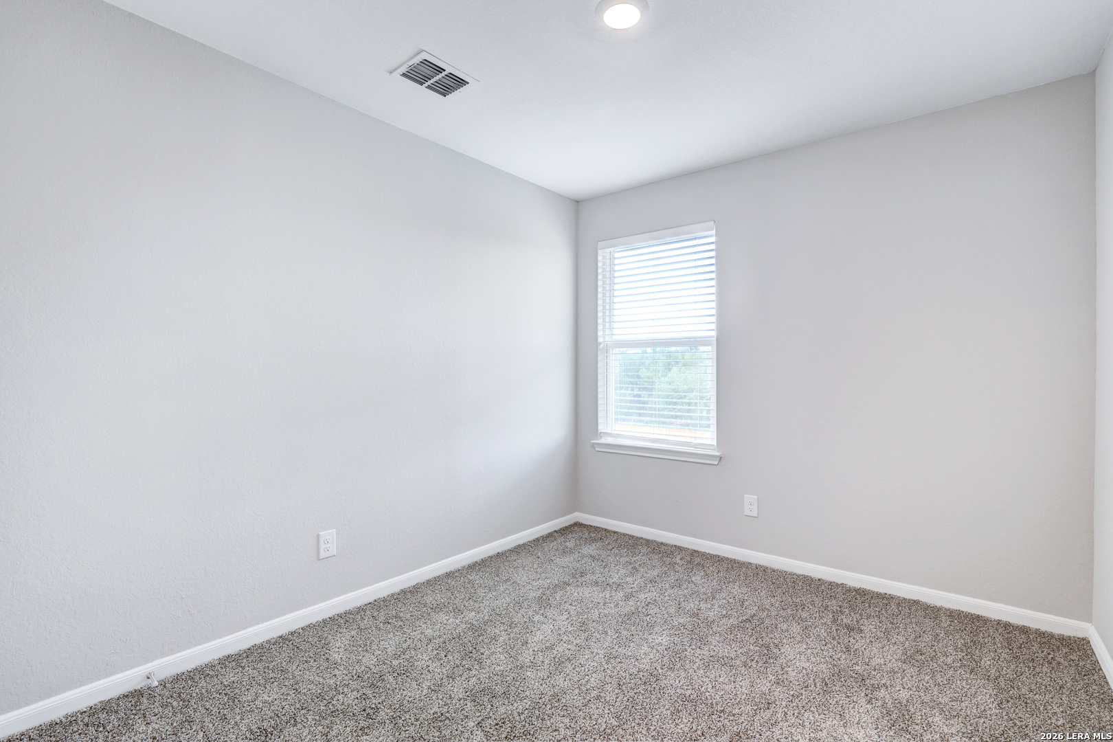 6403 Warhol Cape Converse, TX 78109 - Photo 22 of 29 an empty room with windows