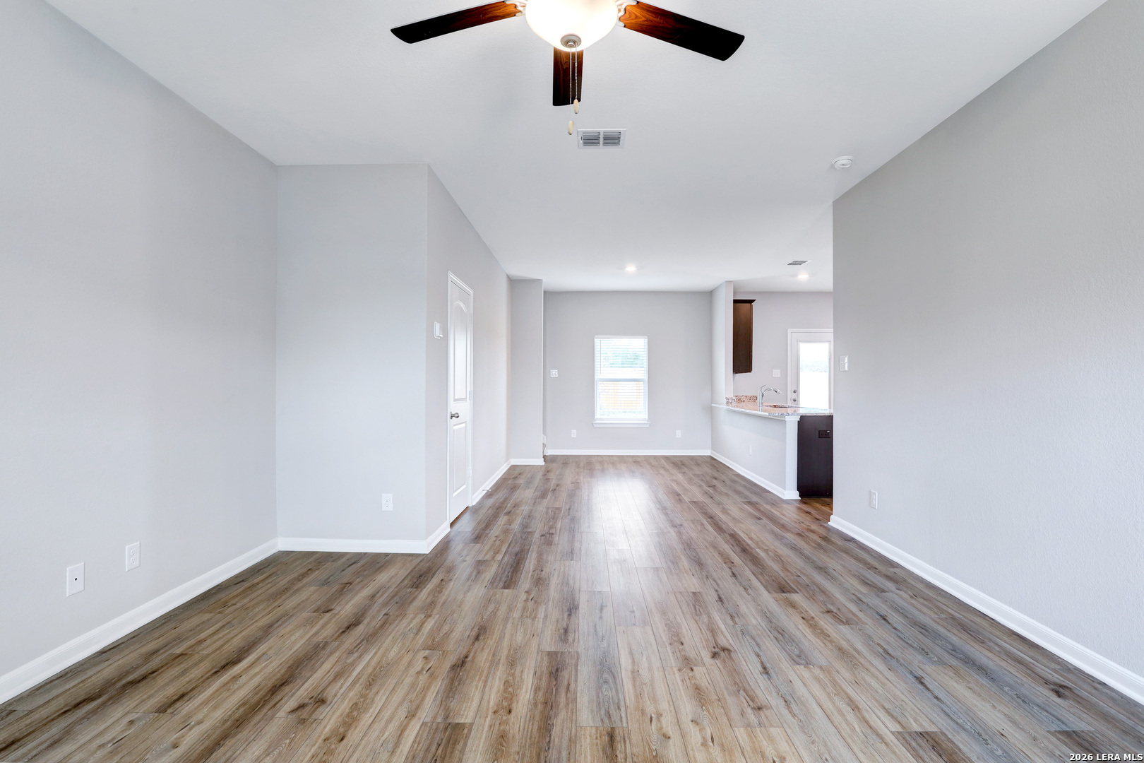 6403 Warhol Cape Converse, TX 78109 - Photo 5 of 29 a view of empty room with wooden floor