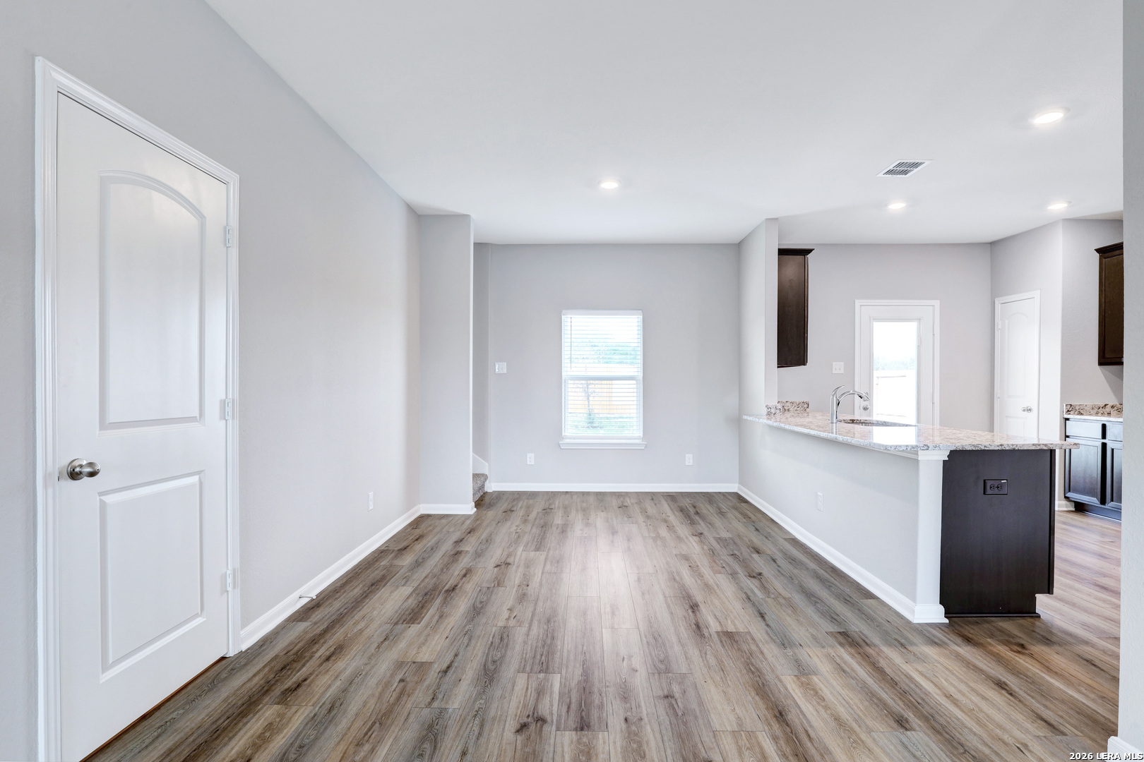 6403 Warhol Cape Converse, TX 78109 - Photo 7 of 29 a view of kitchen with wooden floor and electronic appliances