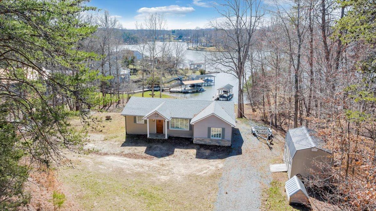 153 Spence Road Union Hall, VA 24176 - Photo 5 of 39 a view of roof deck with table and chairs under an umbrella