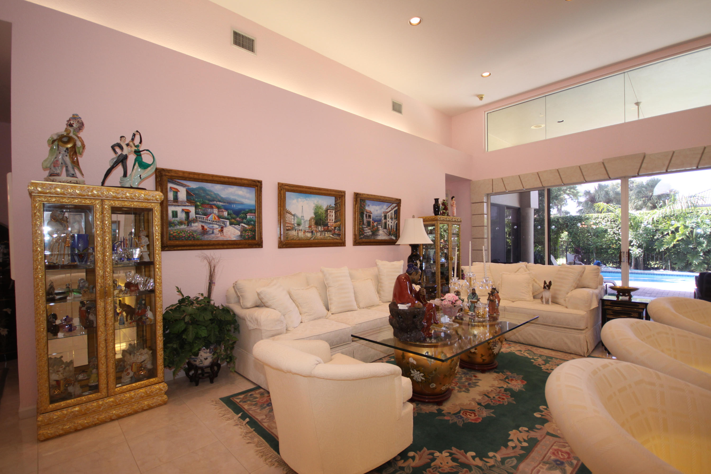 2264 Northwest 60th Street Boca Raton, FL 33496 - Photo 8 of 19 a living room with furniture and a large window