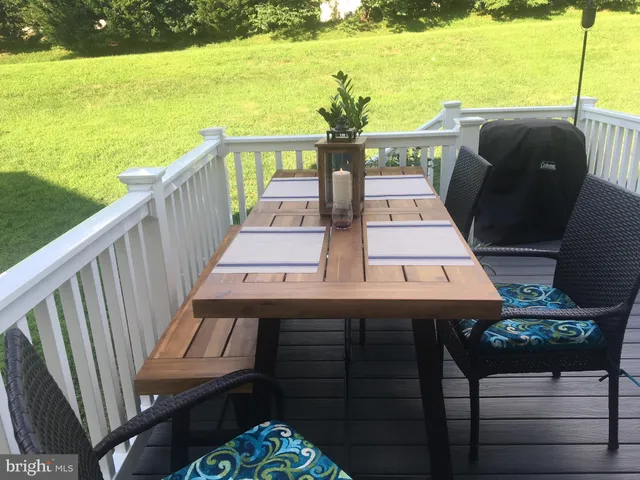 a view of a balcony with ocean view