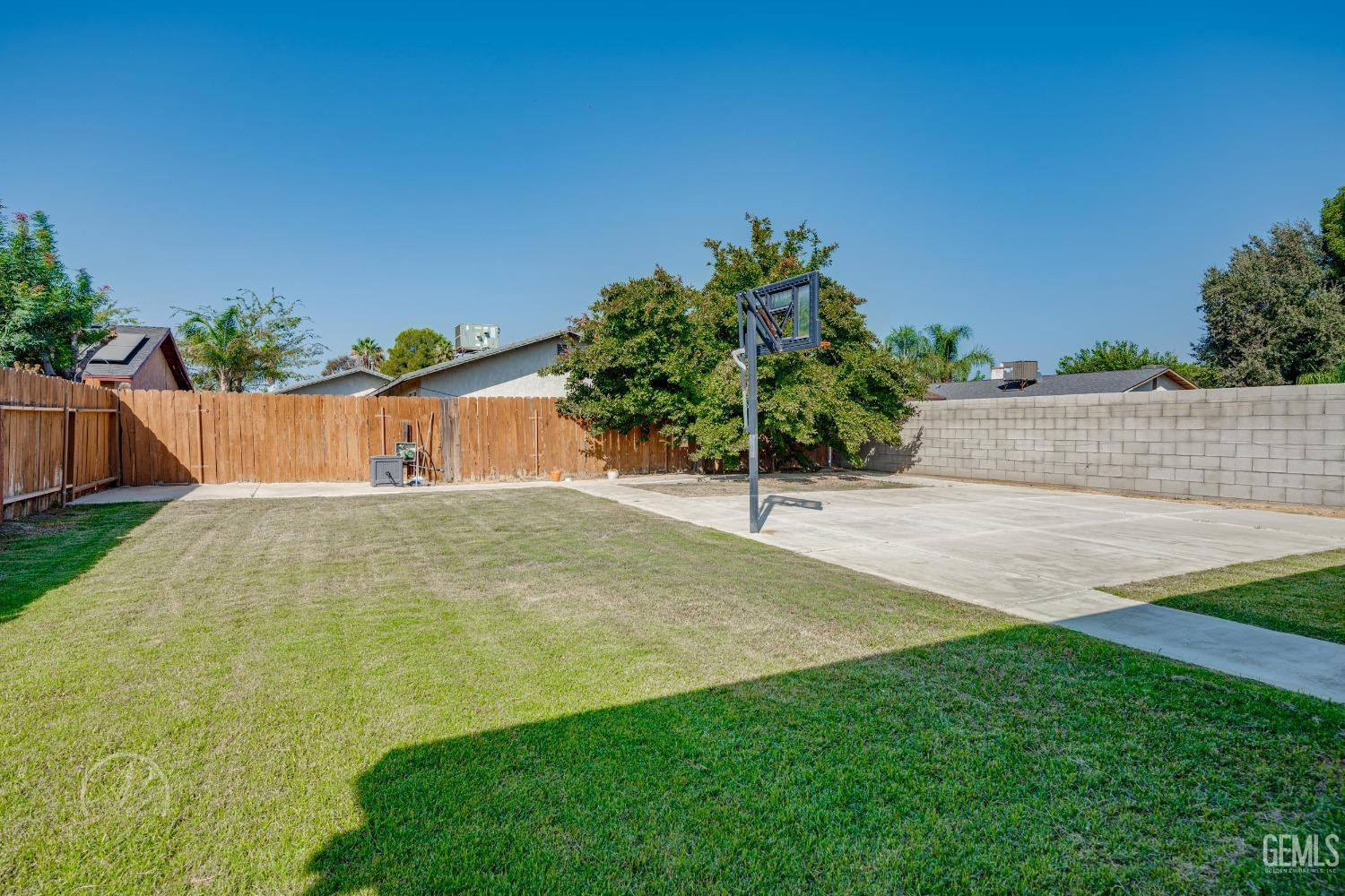 Undisclosed Address Bakersfield, CA 93307 - Photo 18 of 19 a view of a backyard