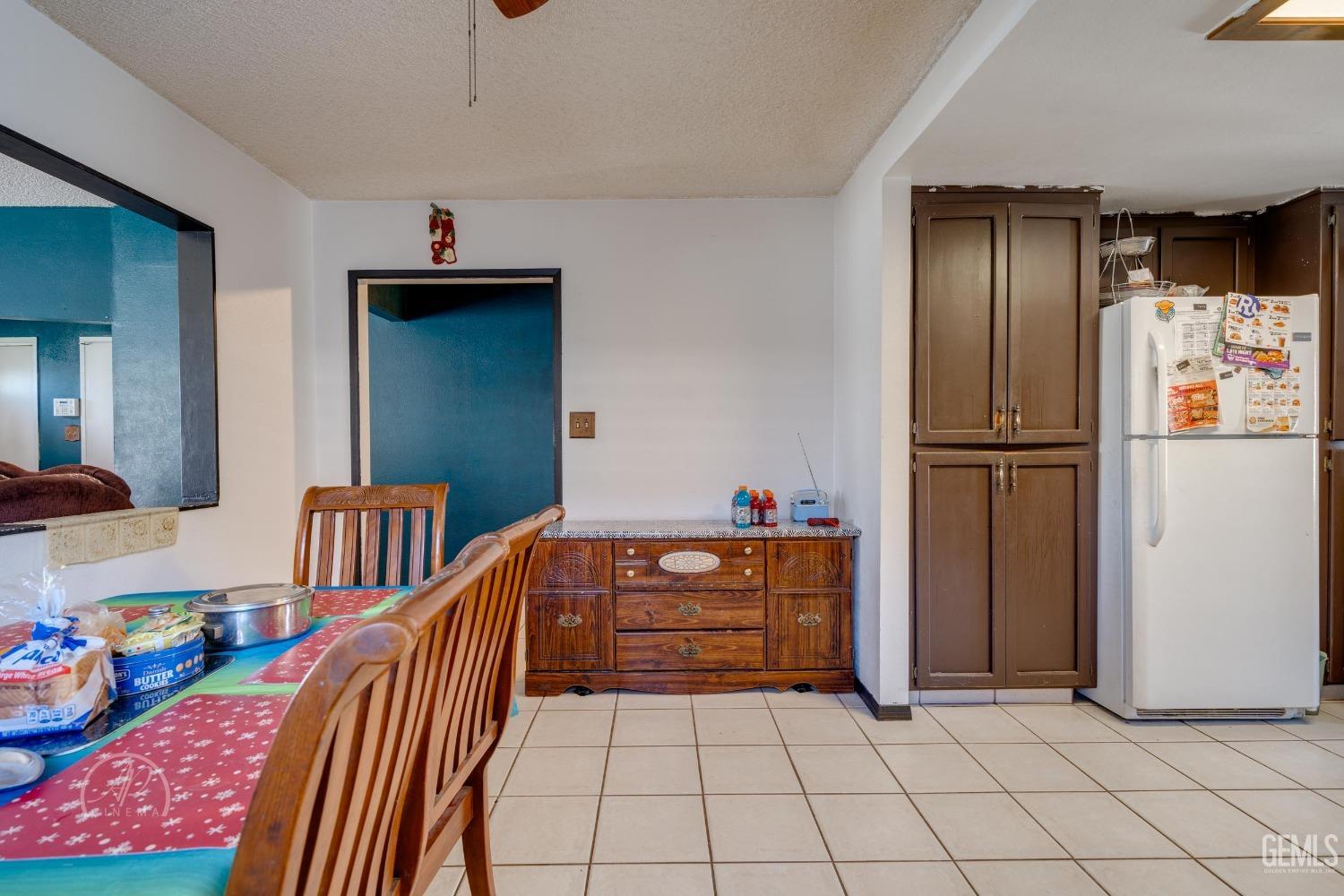 Undisclosed Address Bakersfield, CA 93307 - Photo 8 of 19 a view of a livingroom with furniture and furniture