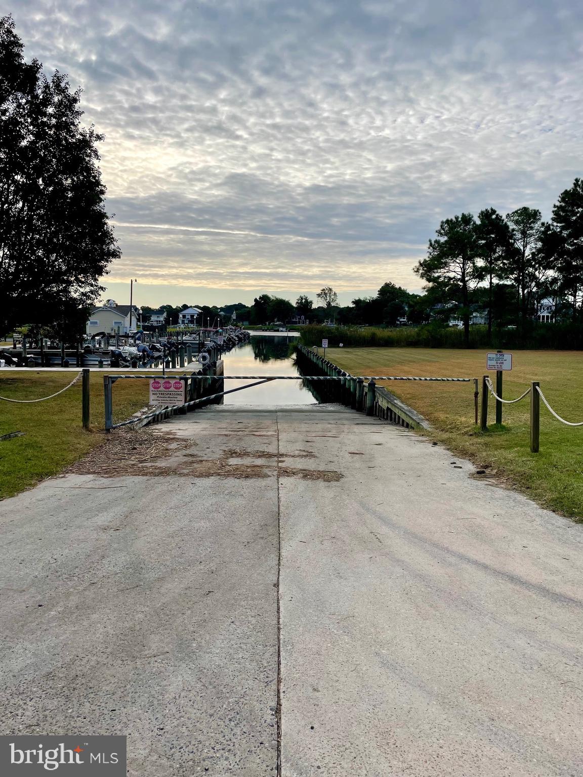 31627 Reading Street Ocean View, DE 19970 - Photo 20 of 21 a view of a lake with a big yard