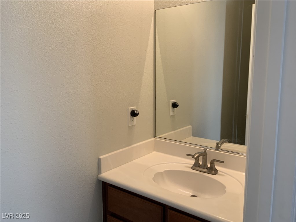 9308 Lakefront Color Street Las Vegas, NV 89178 - Photo 18 of 30 Powder Room Downstairs