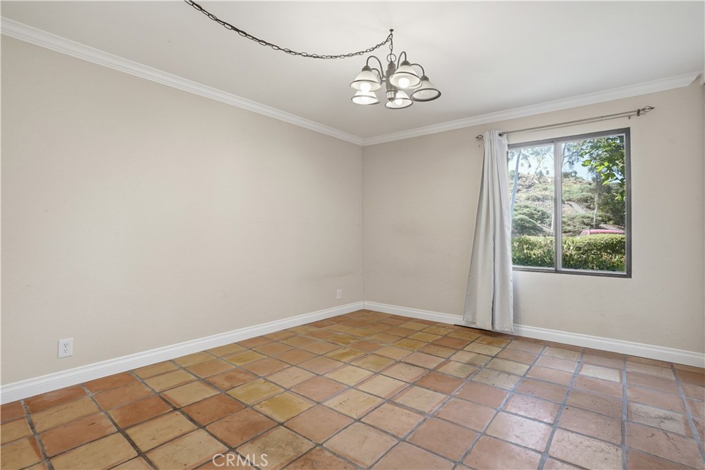 20702 El Toro Road, Unit 231 Lake Forest, CA 92630 - Photo 8 of 36 a view of an empty room with a window