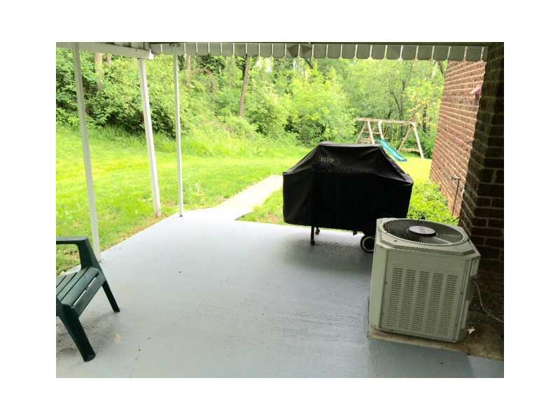 282 McMurray Road Upper St. Clair, PA 15241 - Photo 15 of 25 Patio/Deck. Back patio has been freshly painted and provides plenty of space for grilling.