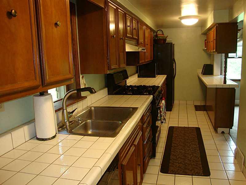 282 McMurray Road Upper St. Clair, PA 15241 - Photo 4 of 25 Kitchen. Galley style kitchen has plenty of cabinet and counter space.