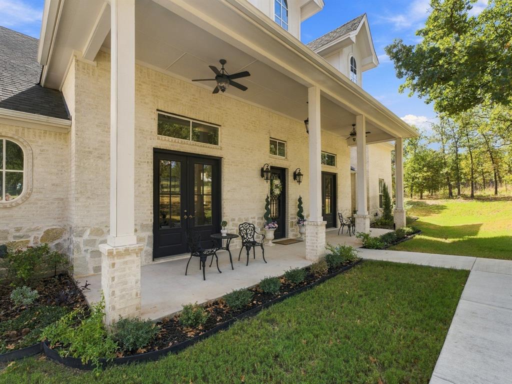330 Rolling Bnd Road Alvord, TX 76225 - Photo 2 of 36 Come spend a quiet morning on the front patio.