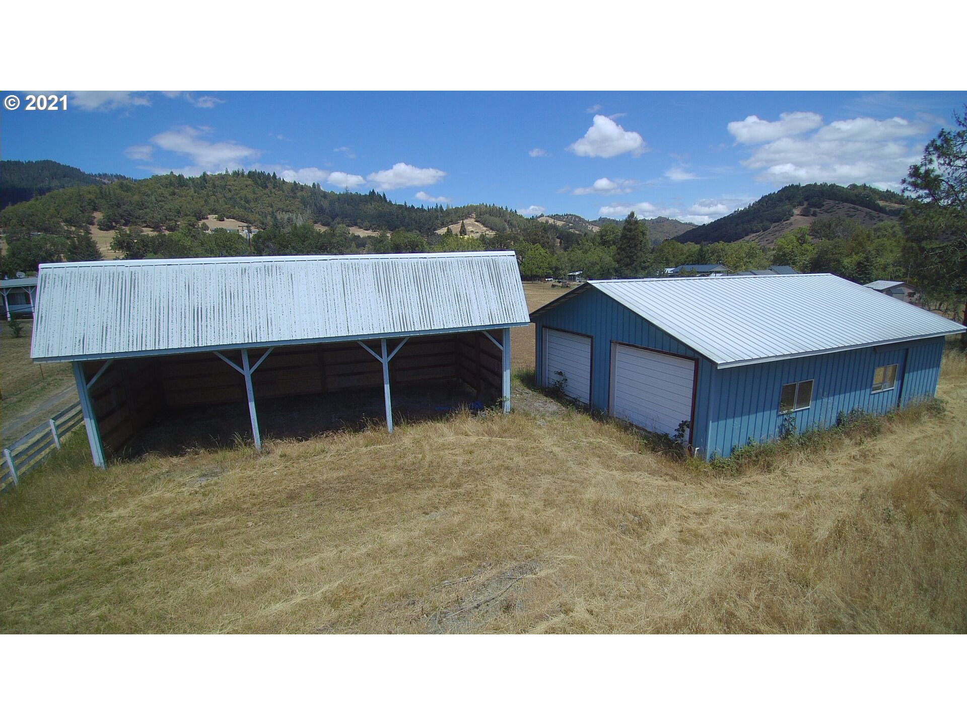 2088 North Myrtle Road Myrtle Creek, OR 97457 - Photo 12 of 32 a view of a backyard with a mountain