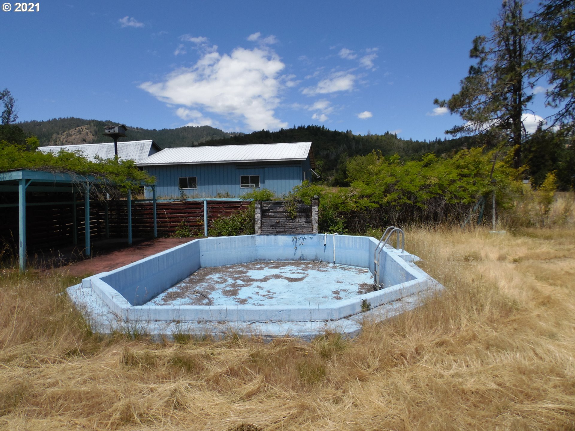 2088 North Myrtle Road Myrtle Creek, OR 97457 - Photo 15 of 32 a view of a swimming pool with a patio