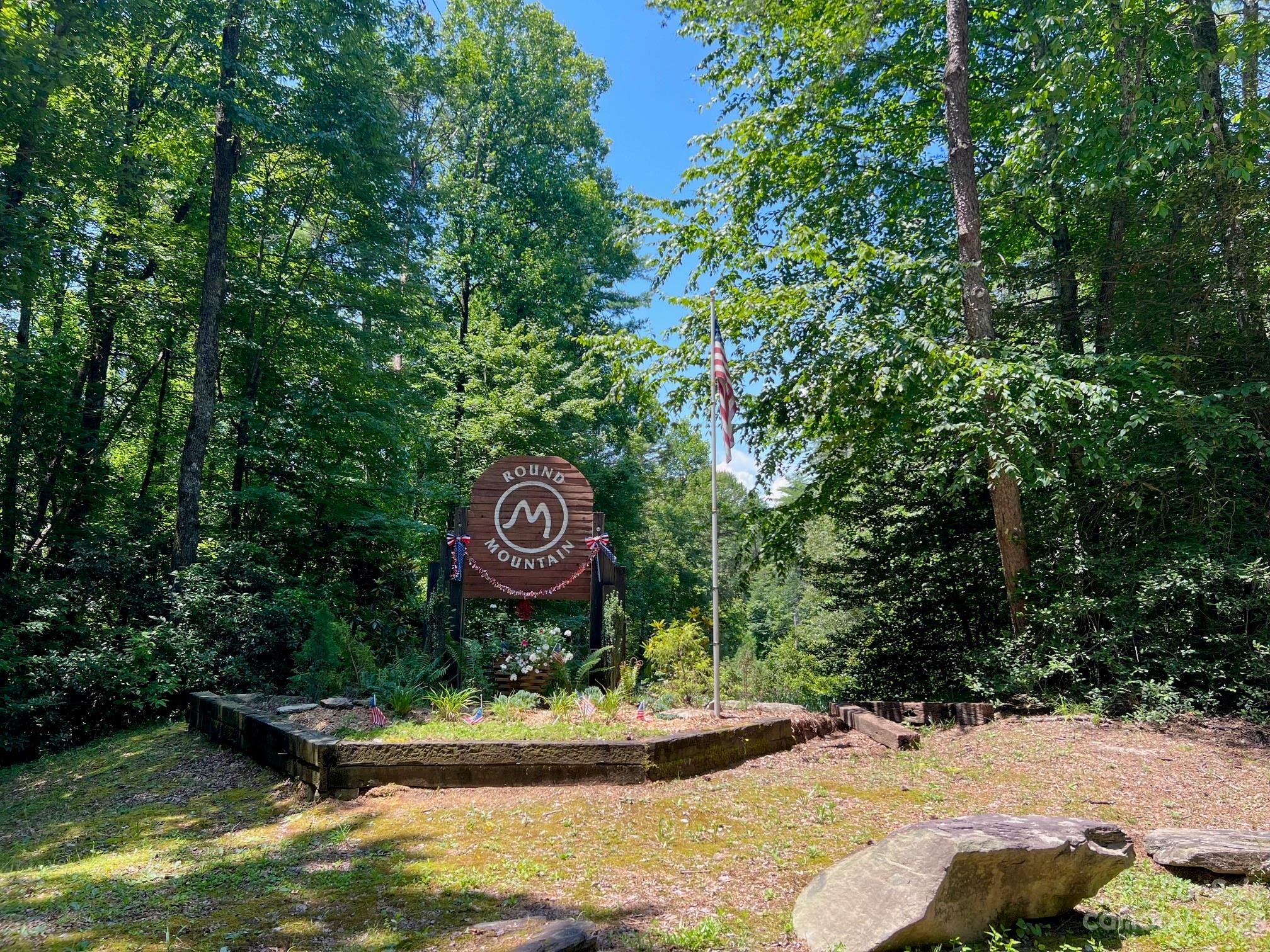 Lot 24 Round Mountain Road, Unit 24 Brevard, NC 28712 - Photo 14 of 22 a view of a water with large trees