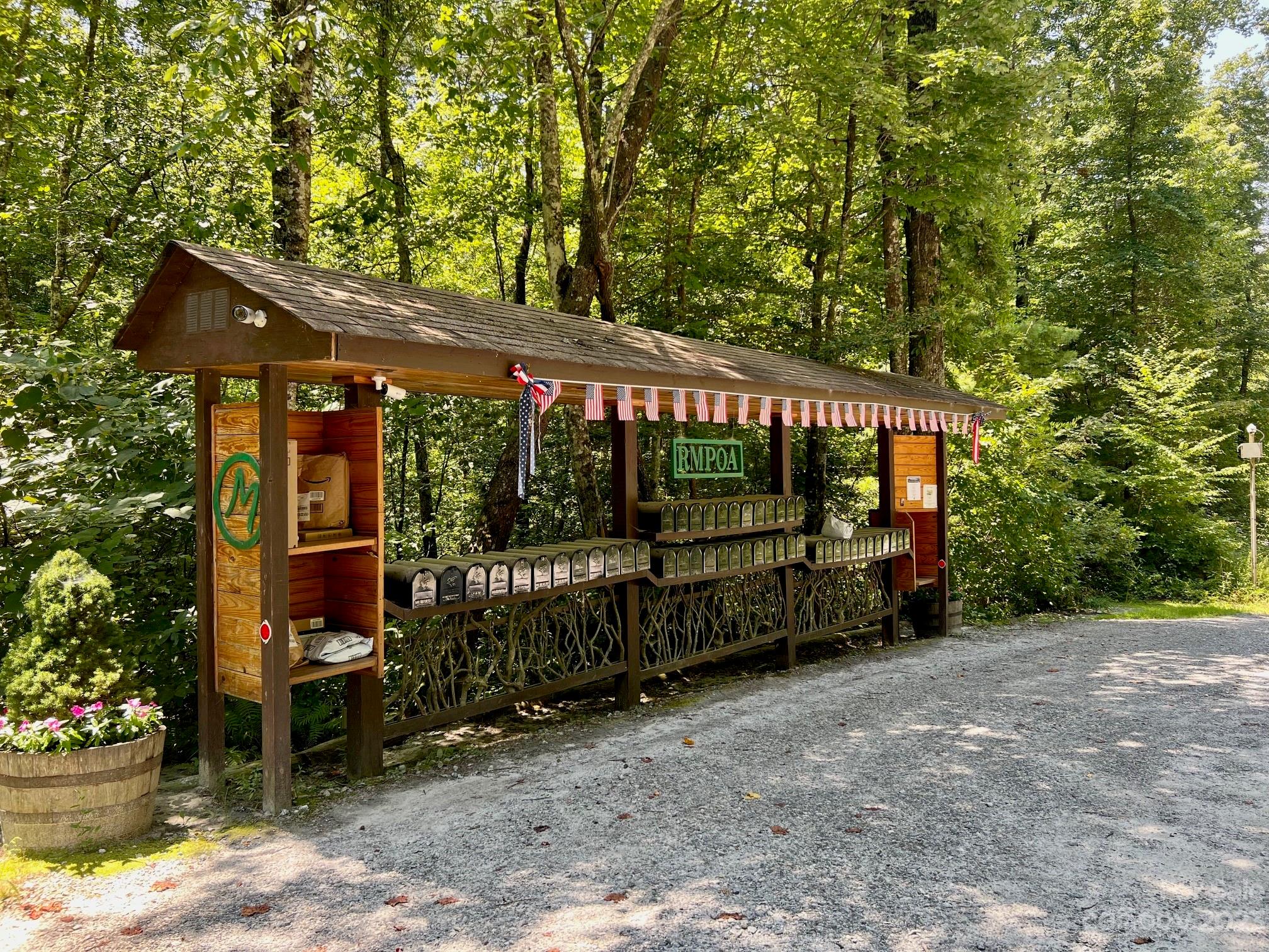 Lot 24 Round Mountain Road, Unit 24 Brevard, NC 28712 - Photo 15 of 22 a view of a house with a yard