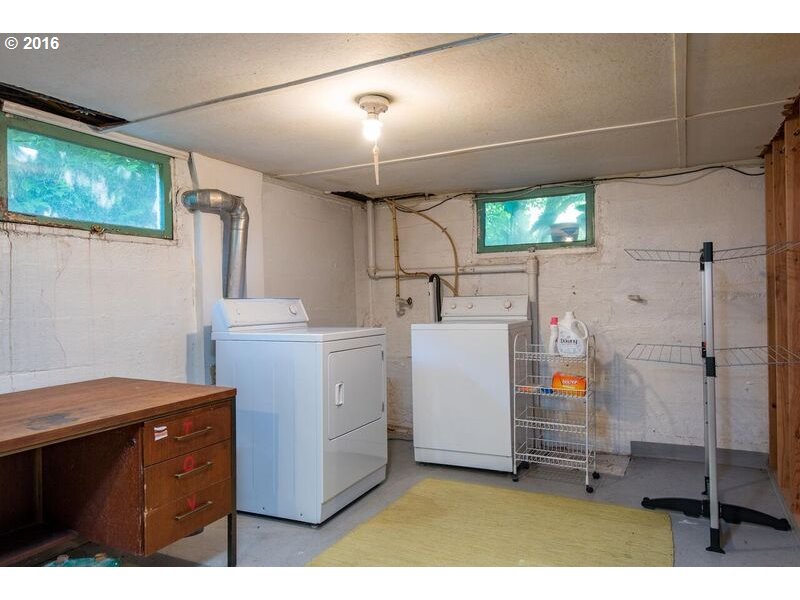 6026 Southwest Vermont Street Portland, OR 97219 - Photo 17 of 24 a utility room with dryer and washer