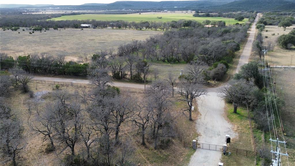 Lot 136 River Canyon Road Palo Pinto, TX 76484 - Photo 22 of 26 a view of a lake with houses