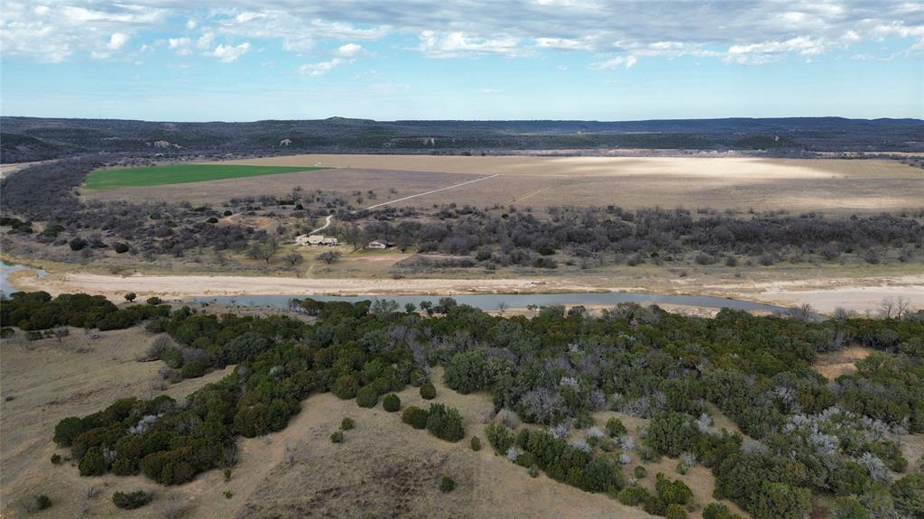 Lot 136 River Canyon Road Palo Pinto, TX 76484 - Photo 25 of 26 a view of a lake with a beach