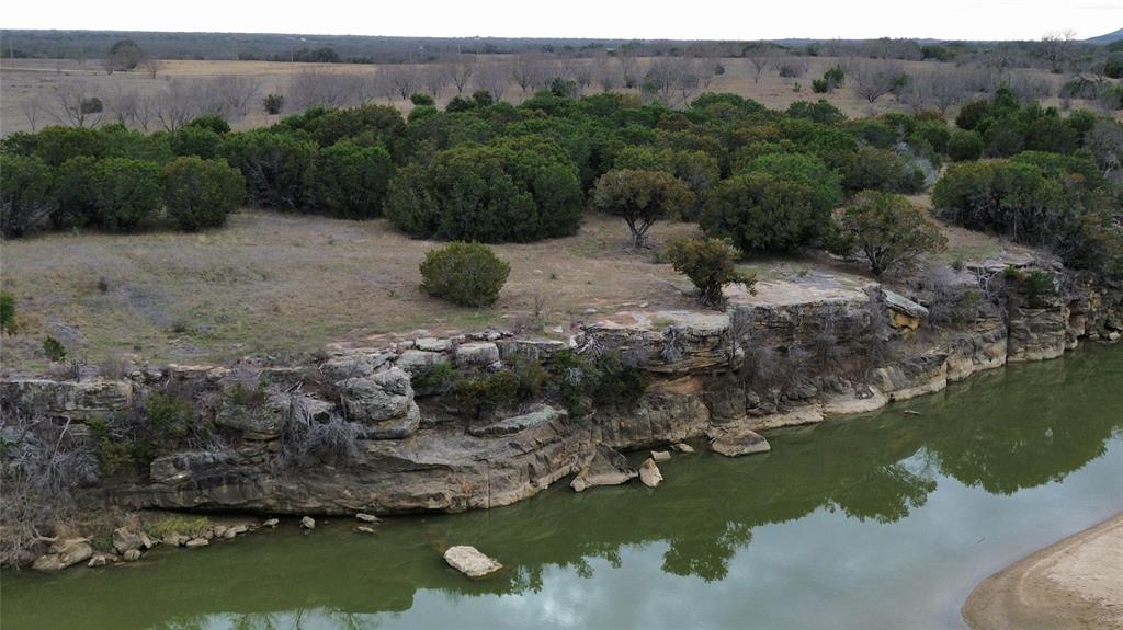 Lot 136 River Canyon Road Palo Pinto, TX 76484 - Photo 10 of 26 a view of a lake with mountain