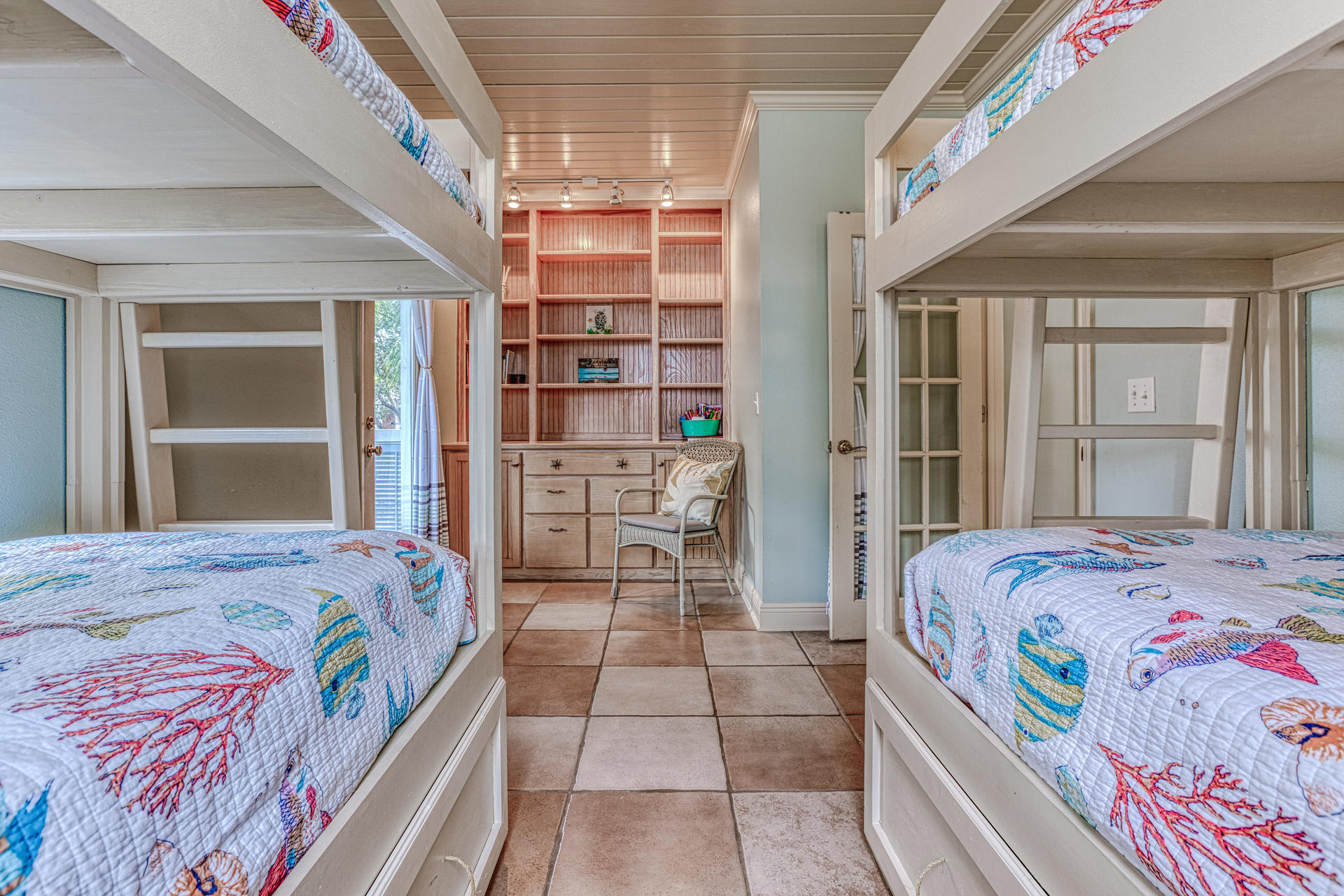18 Draper Lane Santa Rosa Beach, FL 32459 - Photo 16 of 63 a bedroom with a bed bookshelf and a large window