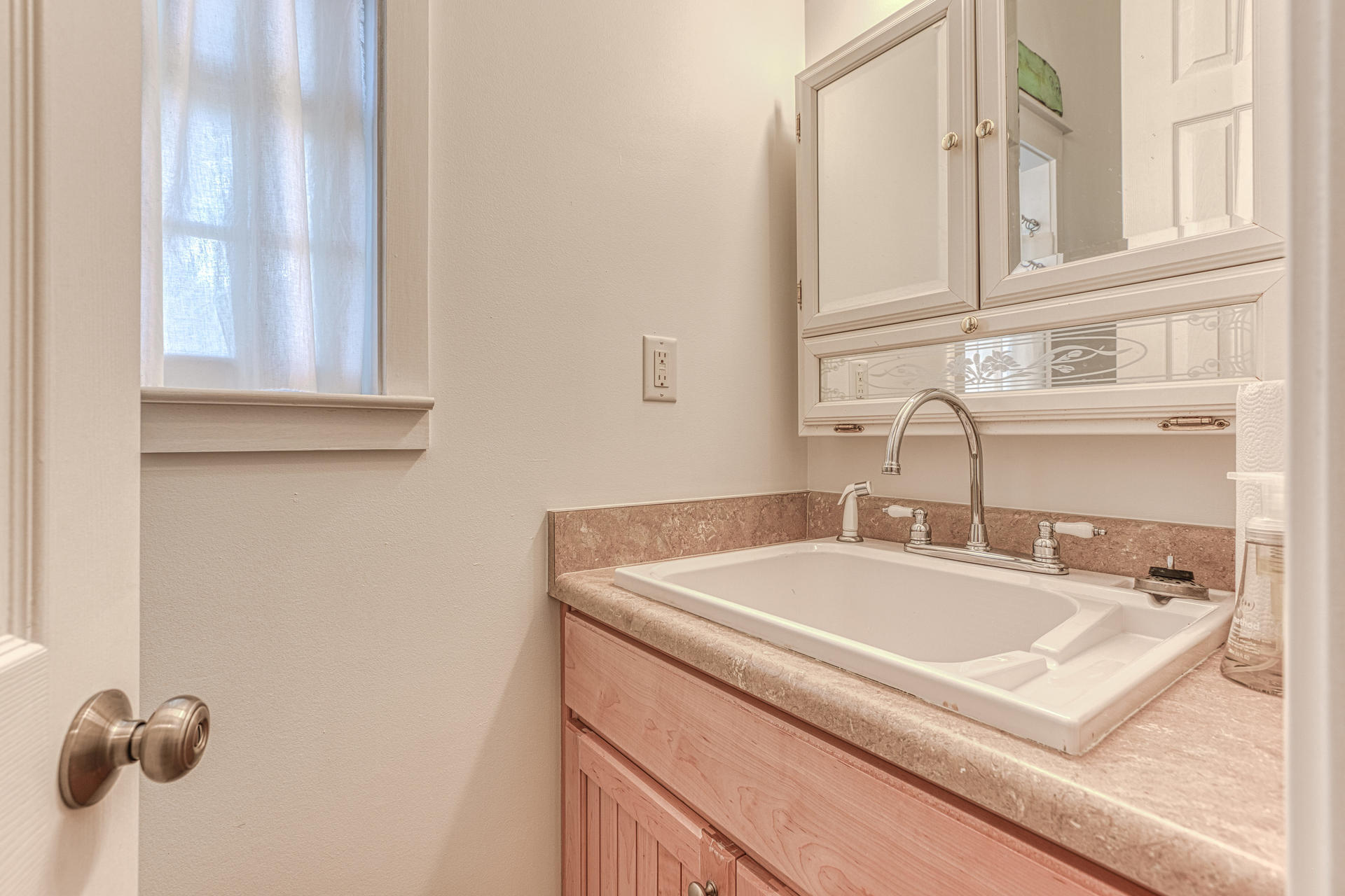 18 Draper Lane Santa Rosa Beach, FL 32459 - Photo 33 of 63 a bathroom with a sink and a mirror